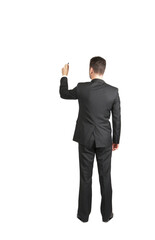 Poster - Rear view of a man in asuit writing with a pen, isolated on white background. Professional concept for presentations or templates