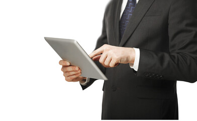 Poster - Close-up of a businessman in a suit using a tablet, isolated on a white background. Concept of technology, business, and modern communication
