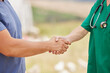 © peopleimages.com - People, farmer and handshake with veterinarian for partnership, healthcare or agro business in countryside. Closeup, animal doctor and farm owner shaking hands for poultry health, thank you or deal
