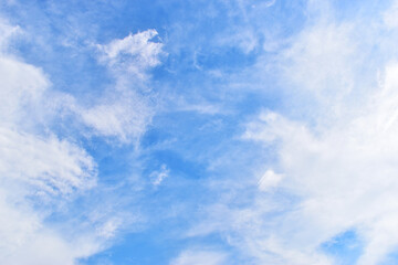 Wall Mural - beautiful blue sky and white fluffy group of clouds with sunrise in the morning, natural background