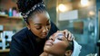 © Dara - A beautician gently massaging a clientâ€™s face, with a relaxed expression and a focus on skincare.