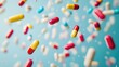 © the - Close-up of colorful pills floating in mid-air