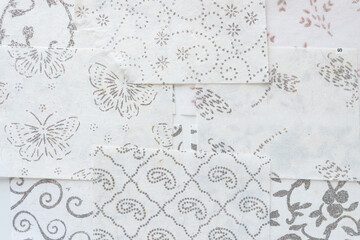 Wall Mural - set of soft white paper sheets with decorative patterns in silver glitter