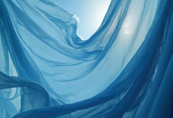 Poster - Blue Fabric Flowing in the Light