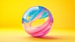 © Petr - Abstract fluid glass sphere in blue and pink tones against a bright yellow background