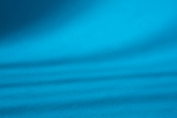  - Creating a calming visual effect. This serene image showcases a smooth. Flowing texture in vibrant shades of blue.