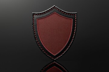 Wall Mural - 3D mockup of a shield-shaped embroidered patch, boldly stitched and displayed on a glossy black surface.