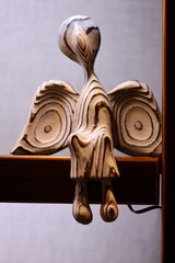 Aufkleber - A close-up shot of a wooden decorative item on a table, ideal for use in still life photography or as a props.