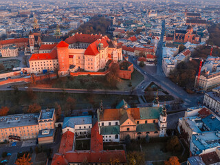 Wall Mural - Wawel castle landmark with city view near river in Krakow Poland. Autumn landscape on coast river Wisla.