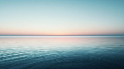 Wall Mural - Minimalist seascape featuring a tranquil ocean reflecting the soft colors of sunrise