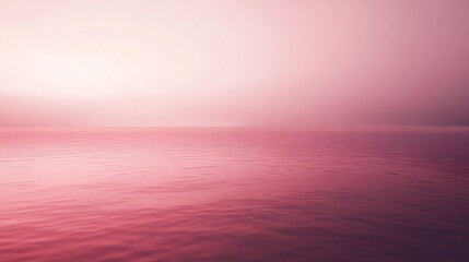 Wall Mural - Calm pink ocean reflecting the sunset, creating a dreamy, misty atmosphere