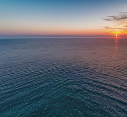 Wall Mural - Summer closeup sunset sea sky landscape. Colorful ocean beach sunrise. Beautiful beach reflections calm waves, soft sandy beach. Perfect tropical coast horizon scenic coast view.generative ai