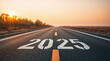 © adynue - Text 2025 written on the road in the middle of asphalt road at sunset. Concept of planning , challenge, business strategy, opportunity ,hope, new life change