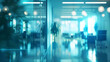© rizkan - A blurred view of a modern office space with plants and soft lighting.