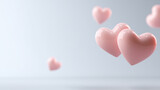 Pink hearts floating on light blue background representing love and valentine's day