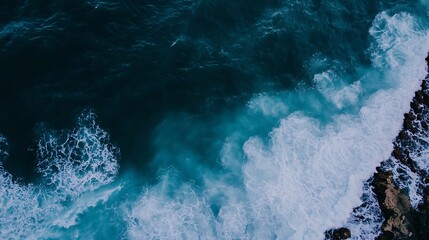 Aufkleber - Aerial View of Deep Blue Ocean Waves Crashing Against Rocky Coastline : Generative AI
