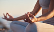 © Duther T/peopleimages.com - Woman, hands or lotus pose meditation on sunset beach, ocean or sea in mental health, mind training or chakra balance. Zoom, peace or zen yogi in calm mudra, relax yoga wellness or sunrise gratitude