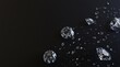 Sparkling diamonds scattered on black background. (1)