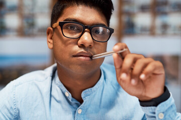 Poster - Thinking, glasses and portrait of man in office for engineering career with civil architecture project. Planning, pride and male construction worker from India with confidence for industrial job.