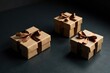 © napak - Three modestly sized kraft paper gift boxes adorned with chocolate brown satin ribbons, arranged on a dark surface, convey a sense of understated elegance and thoughtful presentation.