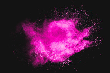 Wall Mural - pink cloud of powdery substance is floating in the air. the image has a dreamy, ethereal quality to 