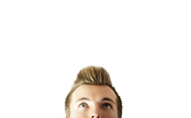 Poster - Close-up of a young man with styled hair looking upwards. Minimalistic design on a white background. Concept of curiosity and ideas