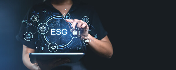 Poster - ESG concept with hand interacting on glowing icons representing