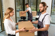 © zinkevych - Group of people working in a delivery point