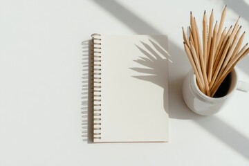 Poster - Minimalist Academic Workspace Open Spiral Notebook with Textured Pages and Pencils - Modern Educational Aesthetic for Creative Digital Content and Student Preparation