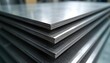 © Vadym - Stacked stainless steel sheets. Metal plates arranged neatly. Industrial metal product. Close up view. Manufacturing process warehouse storage. Pro equipment. Sheet metal components. Quality
