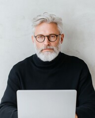 Aufkleber - Industrial Loft Workspace Mature Entrepreneur Analyzing Data on Sleek Laptop Strategic Business Insights and Innovative Growth Solutions for Modern Enterprises