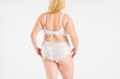 © staras - Overweight thigh, woman with fat hips and buttocks, obesity female body with cellulite on gray background