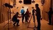 © kinomaster - Studio for photo video production with lighting equipment and cyclorama, team members preparing lights and camera, stylist fixing model makeup before recording.