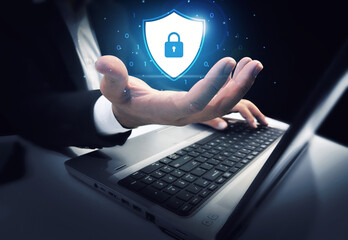 Poster - Security and Privacy concept background with glowing shield and lock floating over the hand. Protected, secured, network, profile, confidential, binary