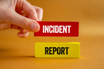 incident report message written on wooden blocks on brown background. conceptual incident report sym