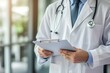 © Anastasiia - A doctor in a white coat holding a clipboard, possibly reviewing patient information in a medical setting. Concept Doctor in White Coat, Patient Information Review, Medical Setting