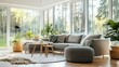 © DREAMERLYN STUDIO - Modern living room with sleek gray furniture, large windows, and natural light streaming in. Air-conditioned with energy-efficient features.