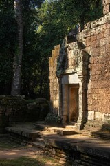 Wall Mural - Ancient stone doorway in Angkor Wat