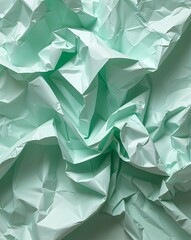 Poster - Pale mint crumpled paper with uneven folds and a soothing gentle look abstract background
