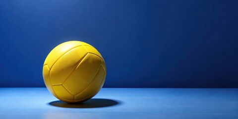 Aufkleber - A vibrant yellow ball rests on a smooth blue surface, casting a subtle shadow, against a deep blue background.