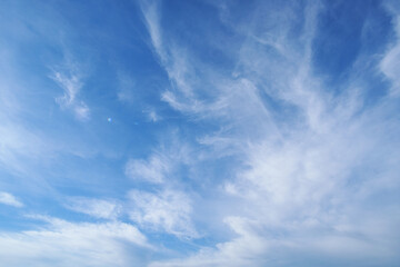 Wall Mural - beautiful blue sky with soft white clouds for abstract background