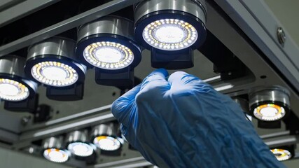 Leinwandbilder - Hands-on assembly process of electronic circuit boards in a modern facility