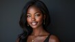 © BlackBird Studio - Elegant African American Woman Smiling with Natural Makeup and Jewelry