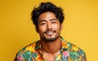 © hakule - A man with a mustache and a floral shirt is smiling