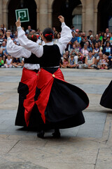 Wall Mural - Basque folk dance performance in an outdoor festival