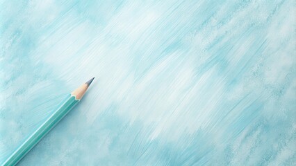 Poster - A light teal colored pencil rests on a subtly textured, painted background, ready for creative expression