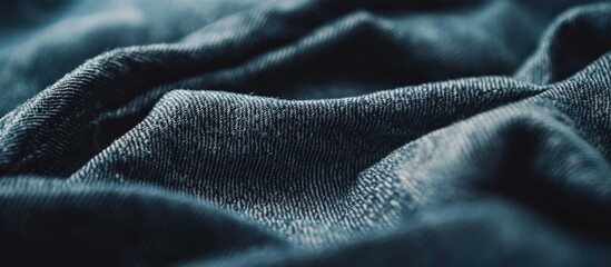 Poster - Dark textured fabric background with soft folds and wrinkles suitable for design work and textile applications Copy Space