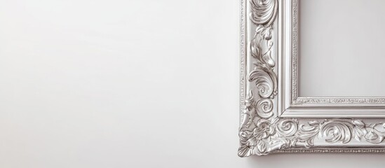 Poster - Ornate silver picture frame on a plain white wall with ample copy space for text placement