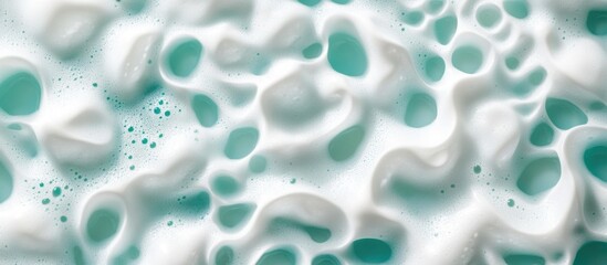 Poster - Abstract texture of white foam with turquoise bubbles creating a dynamic surface pattern suitable for backgrounds Copy Space