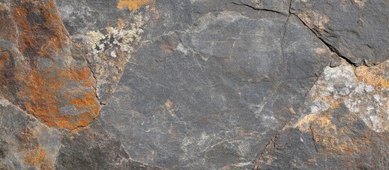 Poster - Textured rocky surface with gray and orange hues featuring natural patterns and variations suitable for backgrounds and design elements. Copy Space